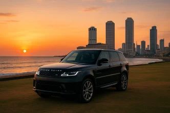 Range Rover Sport at Galle Face Green, Colombo sunset skyline.